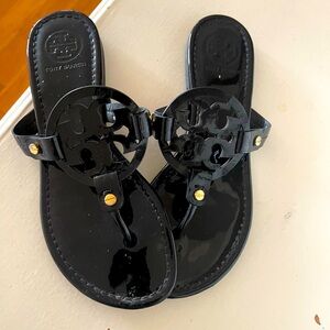 Tory Burch Black Patent . Size 7 1/2 .